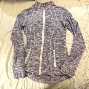 Lululemon jacket size 6 EUC. Lower in back. Thumb holes with flip material.